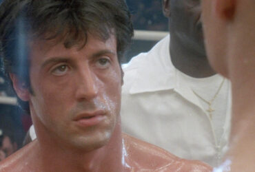 The Heartwarming Reason Why Sylvester Stallone Added Rocky IV's Weirdest Element - SlashFilm