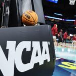 MINNEAPOLIS, MINNESOTA - APRIL 03: The NCAA logo and a game ball as the South Carolina Gamecocks warm-up before the game against the UConn Huskies during the 2022 NCAA Women's Basketball Tournament National Championship game at Target Center on April 03, 2022 in Minneapolis, Minnesota. (Photo by Andy Lyons/Getty Images)