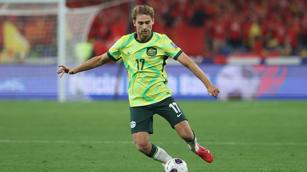 Ryan Teague of Australia competes the ball during the FIFA World Cup Asian Qualifiers Group C match between China and Australia at Hangzhou Olympic Sports Centre Stadium on March 25, 2025 in Hangzhou, China.
